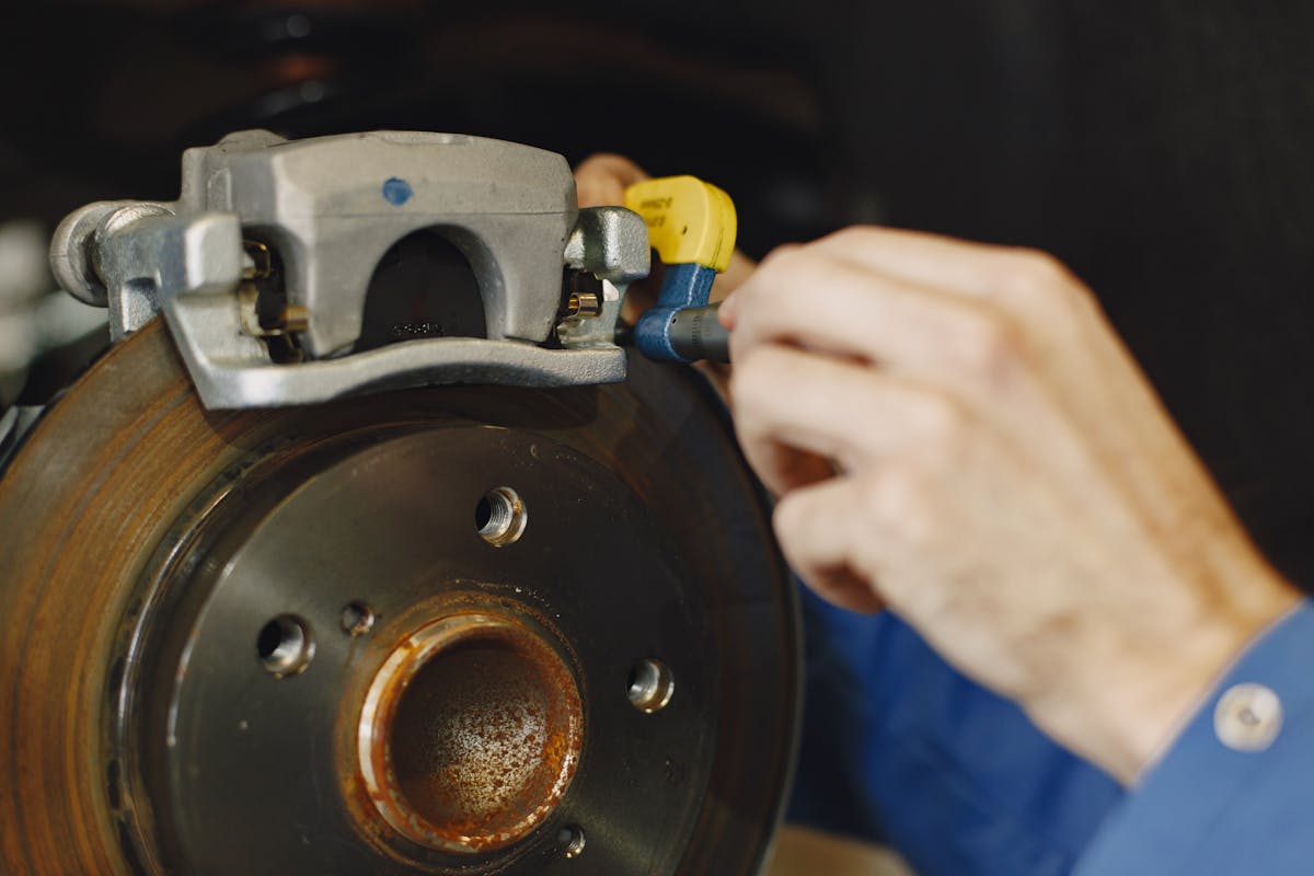 Close-up of a car brake disc and caliper